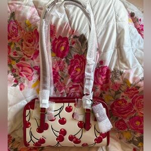 Coach Cherry Swing Zip